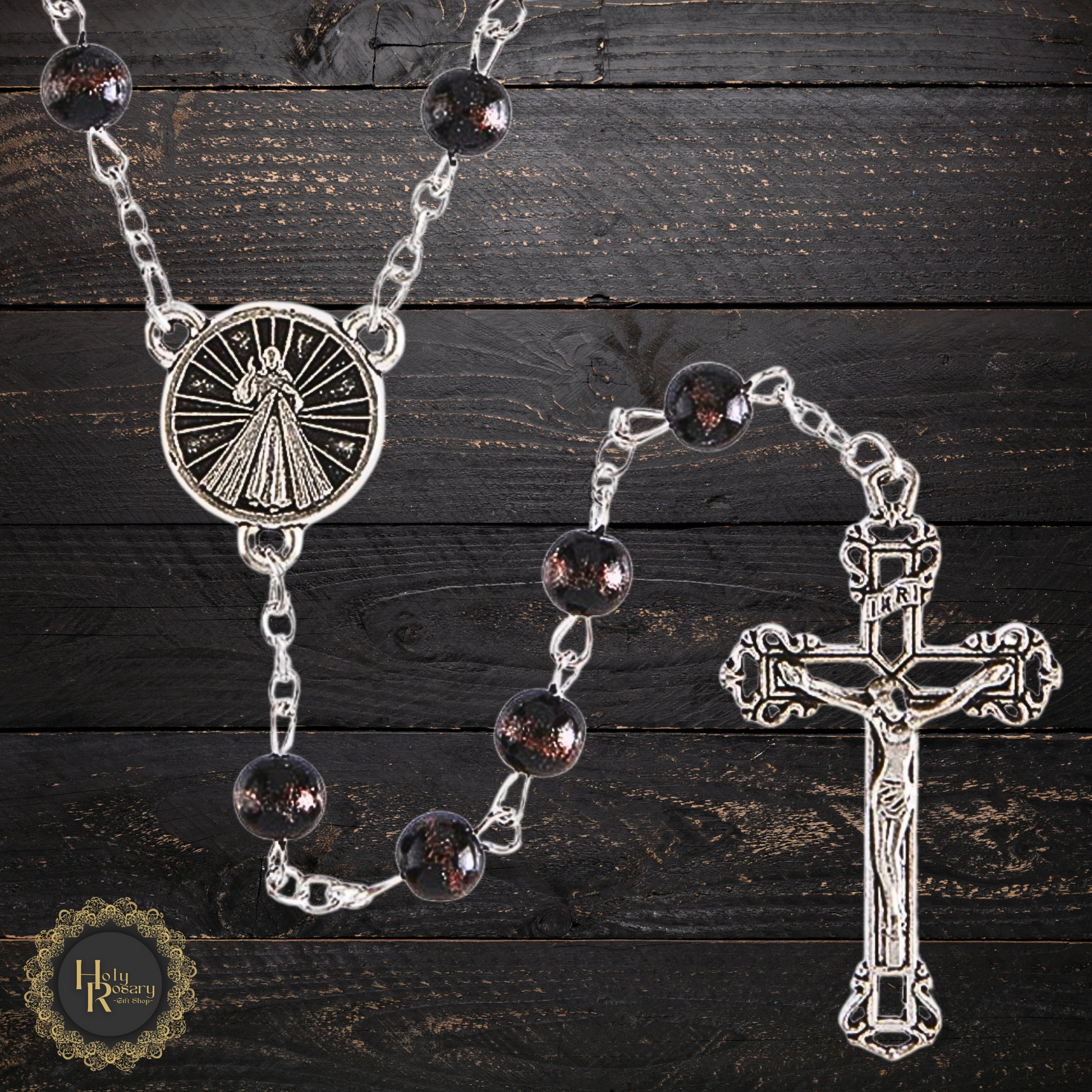 Divine Mercy Rosary Beads for sale arranged flat showing smooth beads and silver cross
