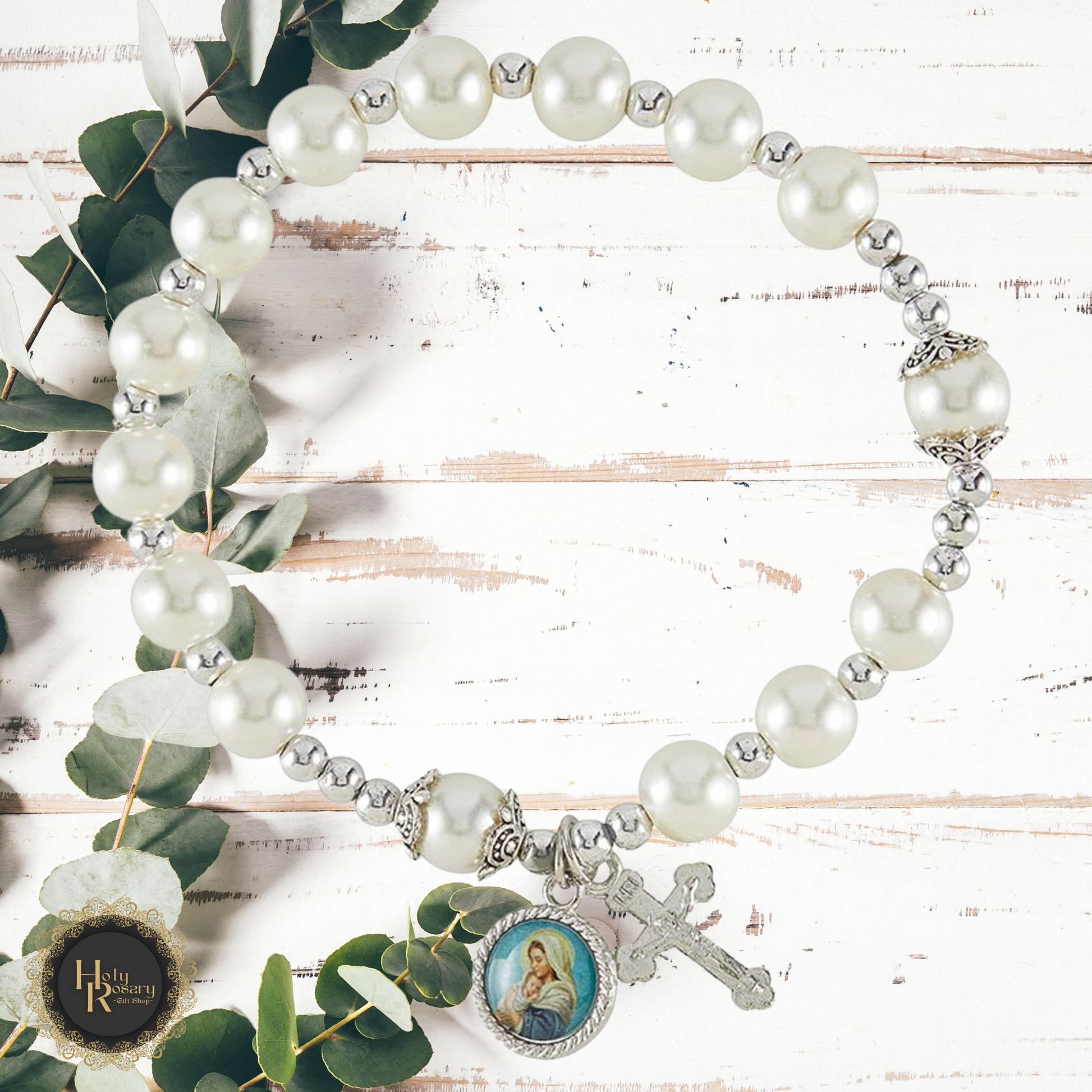 Pearl rosary bracelet featuring shimmering beads ideal for spiritual reflection or prayer